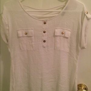 White t-shirt with gold buttons