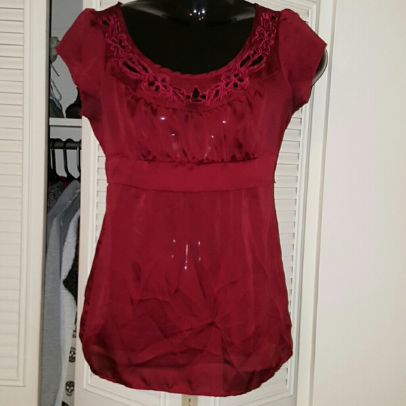 1 Cute Cranberry baby doll shirt with designs.