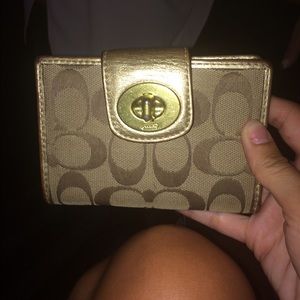 Turn lock gold coach wallet