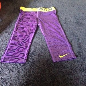 Kids size small Purple Nike Pros.