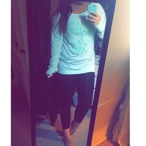 Light blue long sleeve with skull.