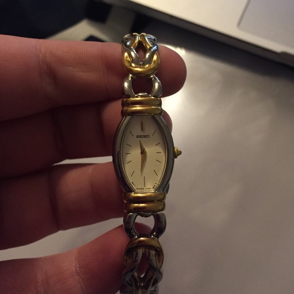 Silver and gold Seiko watch