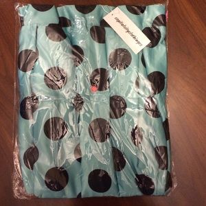 Full, dark mint colored polka dot skirt.