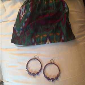 Chann luu purple hoop earrings.