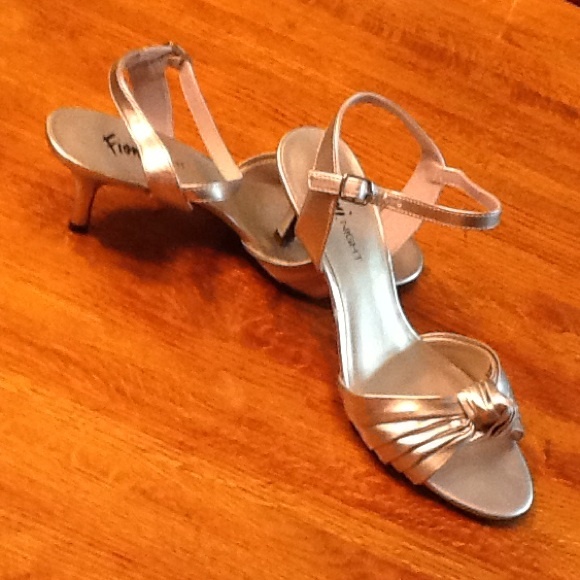 Beautiful silver heels . Wore once in wedding