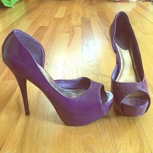 Purple Charlotte Russe four inch pumps size 8