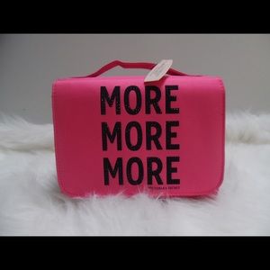 Brand new Victoria Secret travel case with hanger.