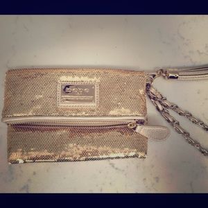 Bebe gold sequined clutch