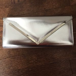 Metallic silver envelope clutch