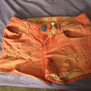 Ripped Orange Shorts