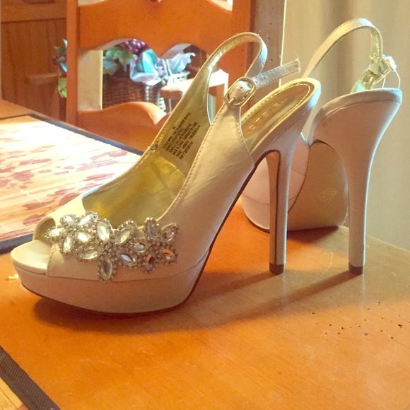 5 1/2 in. white stoned heels