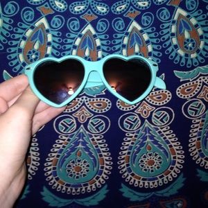 Blue heart shaped sunglasses