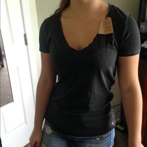 A plain black v-neck top