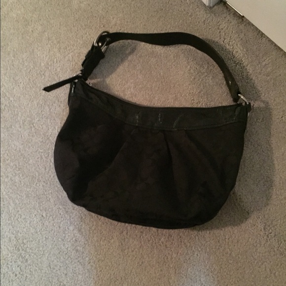 I have used this Coach bag just a few times.