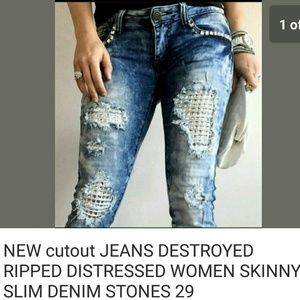 SOLD. Destressed jeans size 29