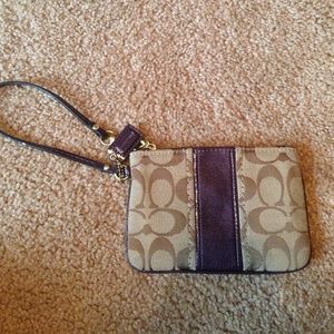 📍 Tan and Purple Coach wristlet 💜