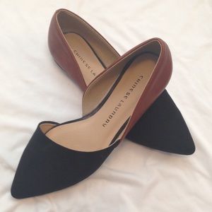 Black and brown pointed flats