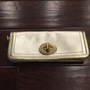 Authentic metallic gold Coach Clutch