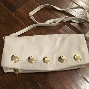 Vieta messenger bag with gold grommets