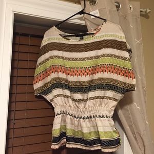 Short sleeved waist-cinched tribal shirt