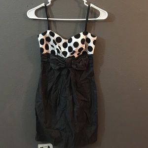 Really cute polka dot dress with denim bottom.