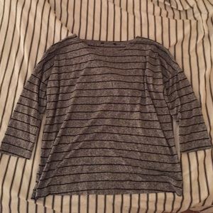 Black and grey striped quarter length sleeve top