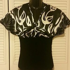 Nice Silk top shirt with black stretch bottom.