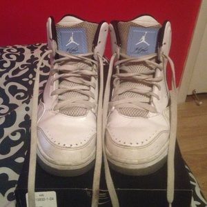 White and blue Jordans