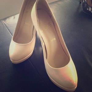 **christian louboutin** beige pumps