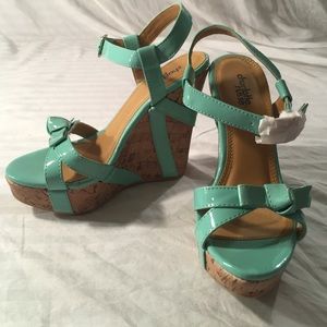 Patent leather and corkscrew wedges