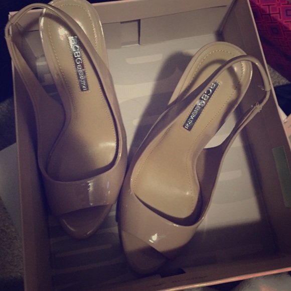 Nude peep toe heels.