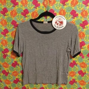 Brandy Melville grey shirt w/ black trim + sticker