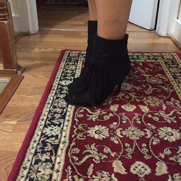 Fringed booties.