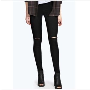 ISO black knee ripped jeans.