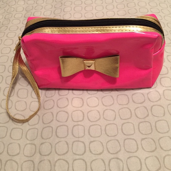 Neon pink makeup bag