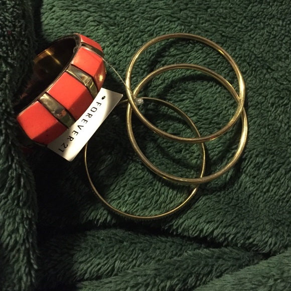4 piece orange bracelet set.