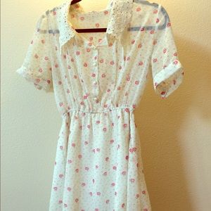 White floral dress with a lace collar