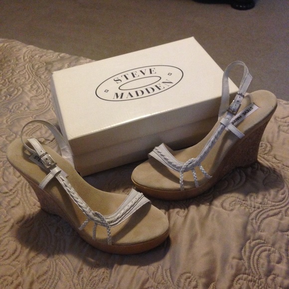 Steve Madden white leather cork-wedge sandals.