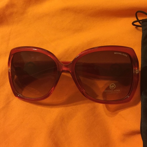 Red Michael Kors shades.