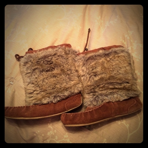 Tall fur moccasins