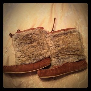 Tall fur moccasins