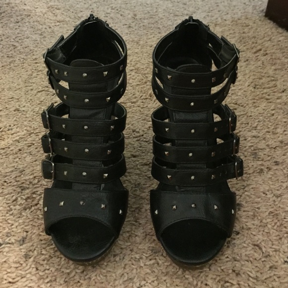Black studded wedges by Material Girl