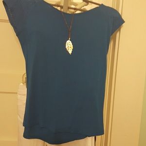 The limited blue shirt.