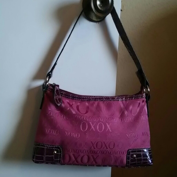 Xoxo. Burgundy/rose color handbag