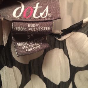 Black and white polka dot sleeveless top