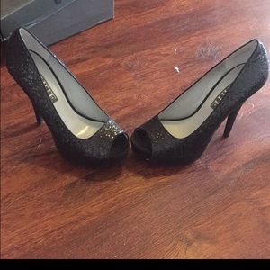 Back Vera Wang heels.