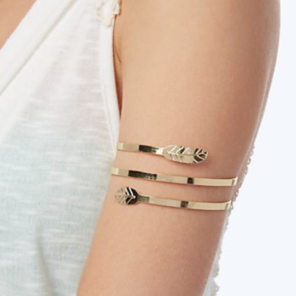 Embossed leaf spiral arm cuff