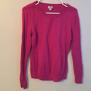Small pink sweater.