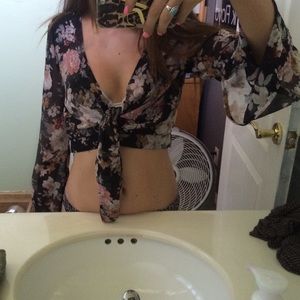 Sheer floral blouse. Never worn out