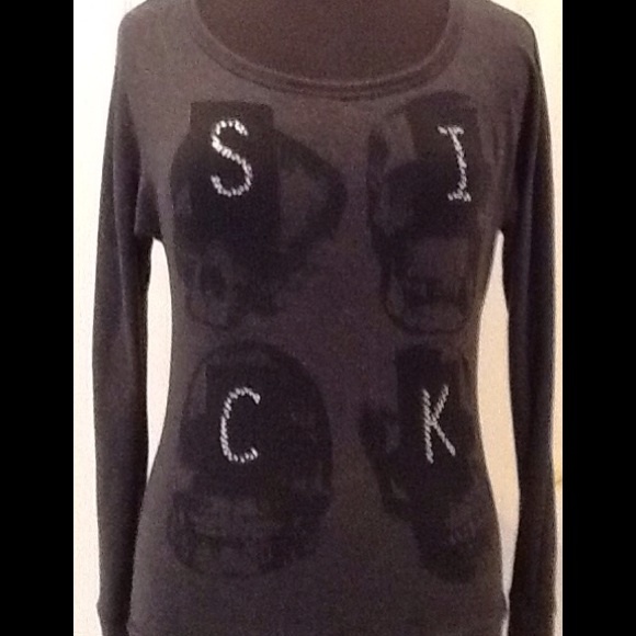 Teenage runaway skull top